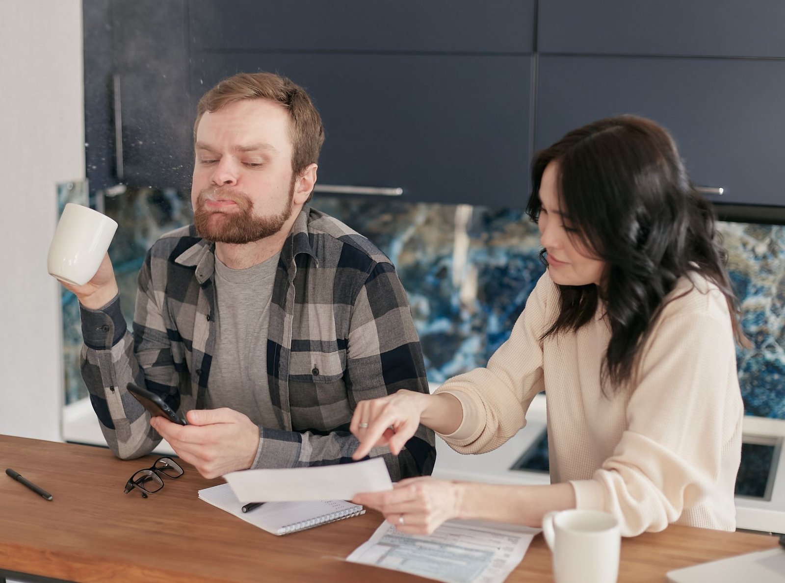 A veteran and spouse organizing records to support a nexus letter for a VA claim