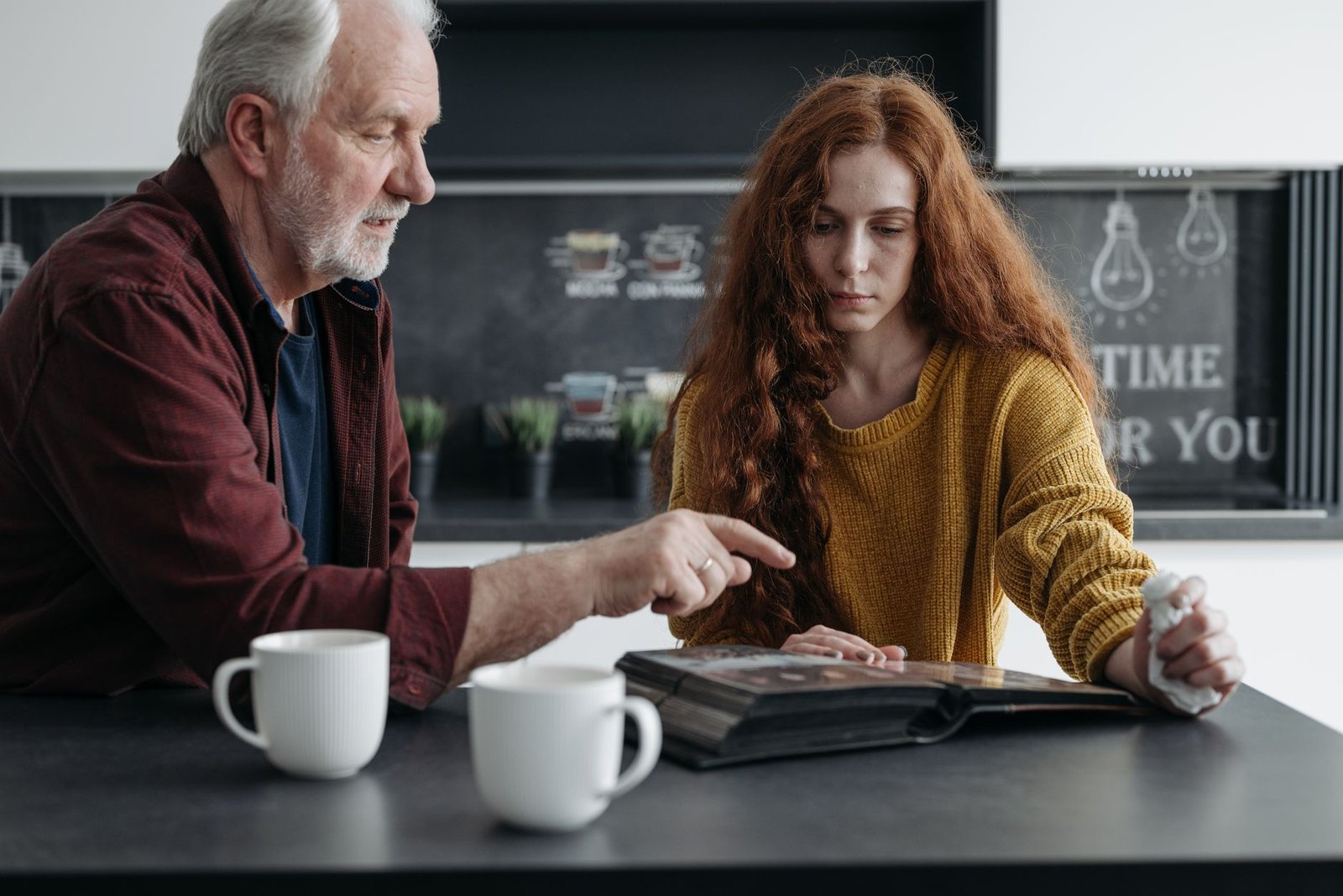 Adult child helping a veteran manage monthly VA benefit payments under the fiduciary program