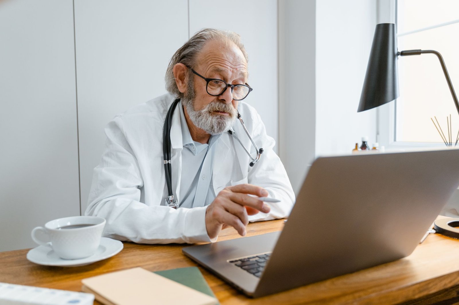 A veteran attending a VA mesothelioma treatment telehealth appointment from home